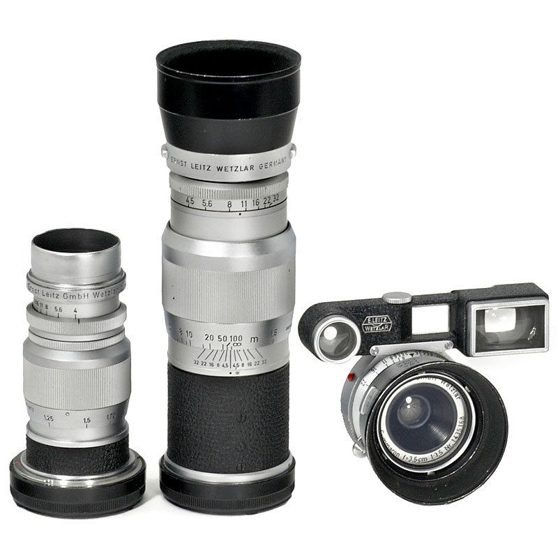 3 Leica M Lenses: 3 Leica M Lenses Leitz, Wetzlar. 1) Summaron 3,5/35 cm, no. 1435168, M3-eyes, with UVa filter and IROOA lens hood. (2-/2) – 2) Elmar 4/9 cm, no. 1339222, with caps and FISON lens hood. (2–3/2) –