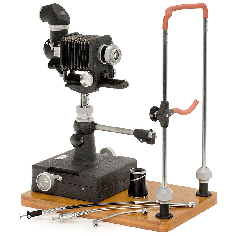 Leitz Medical Device: Leitz Medical Device Leitz, Wetzlar. Equipment for macro photography of the human face. Solid base can be moved by rack-and-pinion in all directions. Fitted with Bellows I, Visoflex I, 2 magnifiers, 3