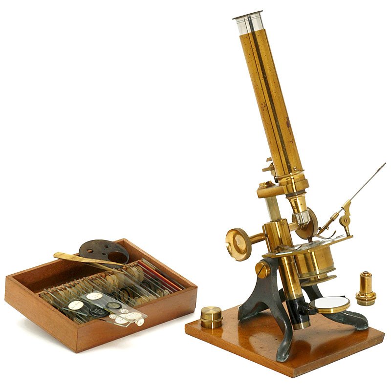 English Brass Microscope, c. 1900: English Brass Microscope, c. 1900 Marked on the base: "Benn Franks Optician, Hanley, Hull", detachable tube, height 11 ¾ in., with 25 glass slides and accessories in a fitted mahogany case. Englische
