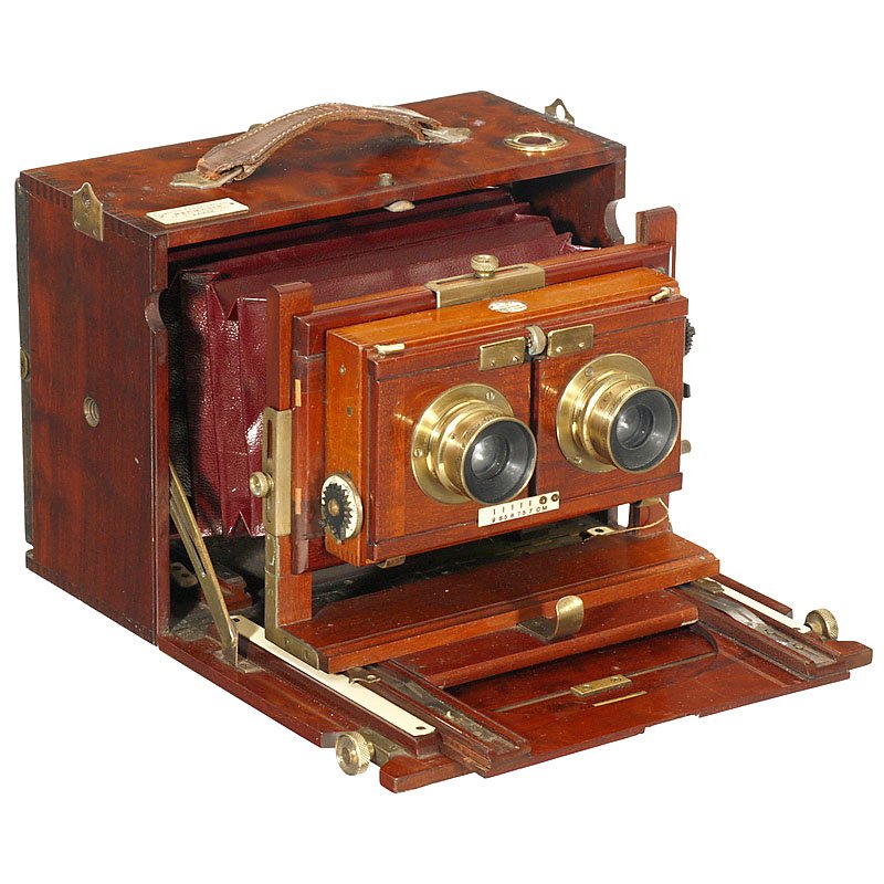 Hermagis "Stéréo Multiple, c. 1899: Hermagis "Stéréo Multiple, c. 1899 Hermagis, 18, Rue Rambuteau, Paris. Plate size 5 x 7 in., root wood with brass trim, dark-red bellows, leather grip loose, viewfinder missing, lenses: 2 x Hermagis