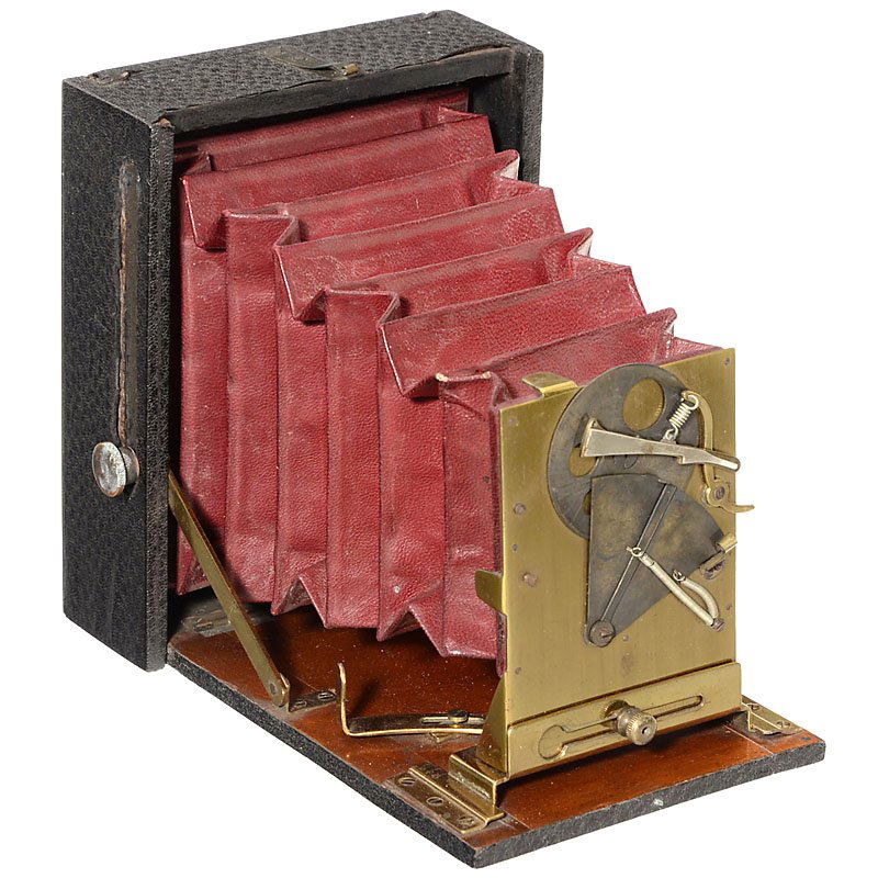 Unusual Plate Camera, c. 1900: Unusual Plate Camera, c. 1900 Unmarked, presumably from England, size 2 ¾ x 4 in., black leather covering, dark-red bellows, radial lever for focusing. Brass board with unusual shutter (small spring