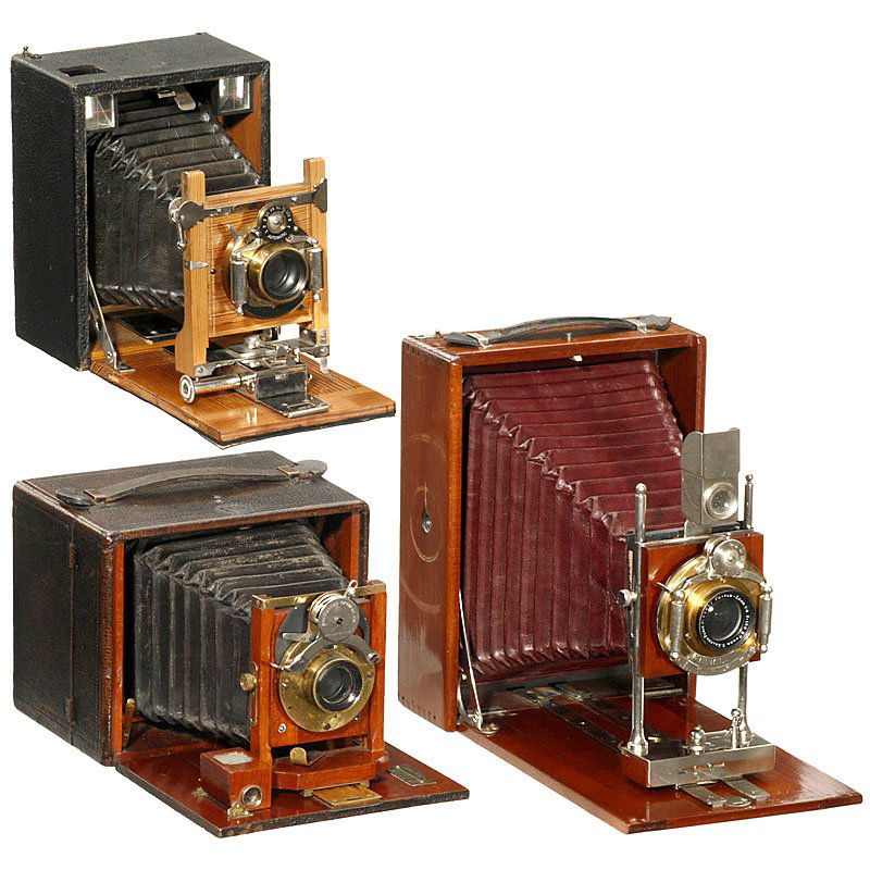 3 Flat-Bed Cameras, c. 1900: 3 Flat-Bed Cameras, c. 1900 All cameras unmarked. 1) France, size 5 x 7 in., polished wood with nickel trim, dark-red bellows, lens: Krauss, Paris "Protar-Zeiss 1:9 F = 196 mm" in Unicum shutter, focu