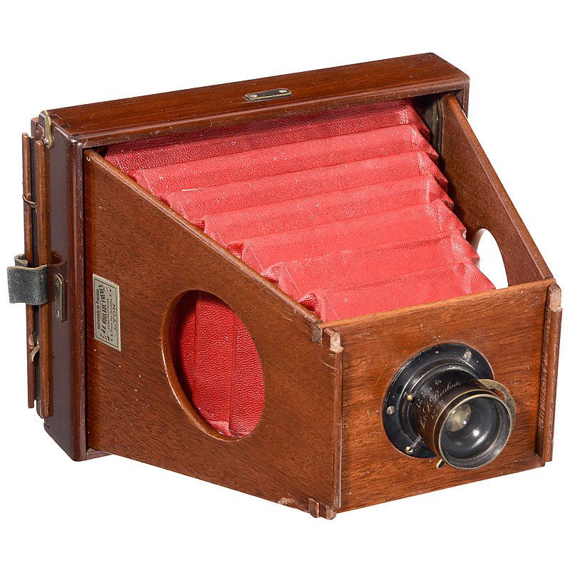 Strut-Folding Camera by L. & A. Boulade Frères, c. 1885: Strut-Folding Camera by L. & A. Boulade Frères, c. 1885 "Instruments de Précision L. & A. Boulade Frères, 8, Place de Jacobins 8, Lyon". Plate size 5 x 7 in., wooden struts, red bellows, lens: "L.