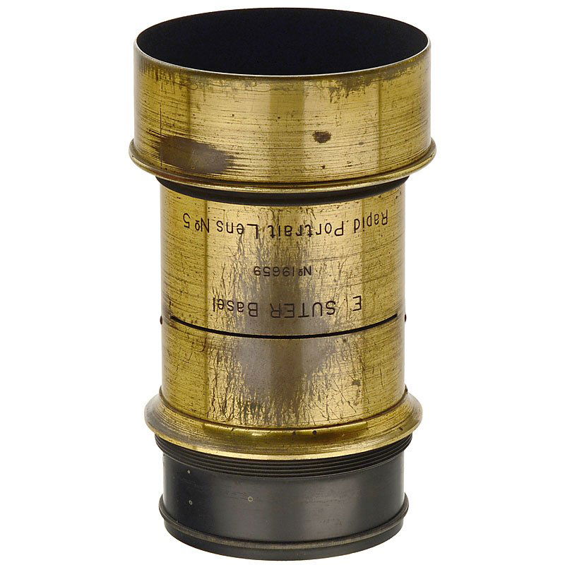 Rapid Portrait Lens No. 5 by Suter: Rapid Portrait Lens No. 5 by Suter E. Suter, Basel. No. 19659, for waterhouse stop, height of the lens with lens hood 7 1/2 in., Ø 4 1/3 in., clean optics! Rapid Portrait Lens No. 5 von Suter E. Sute