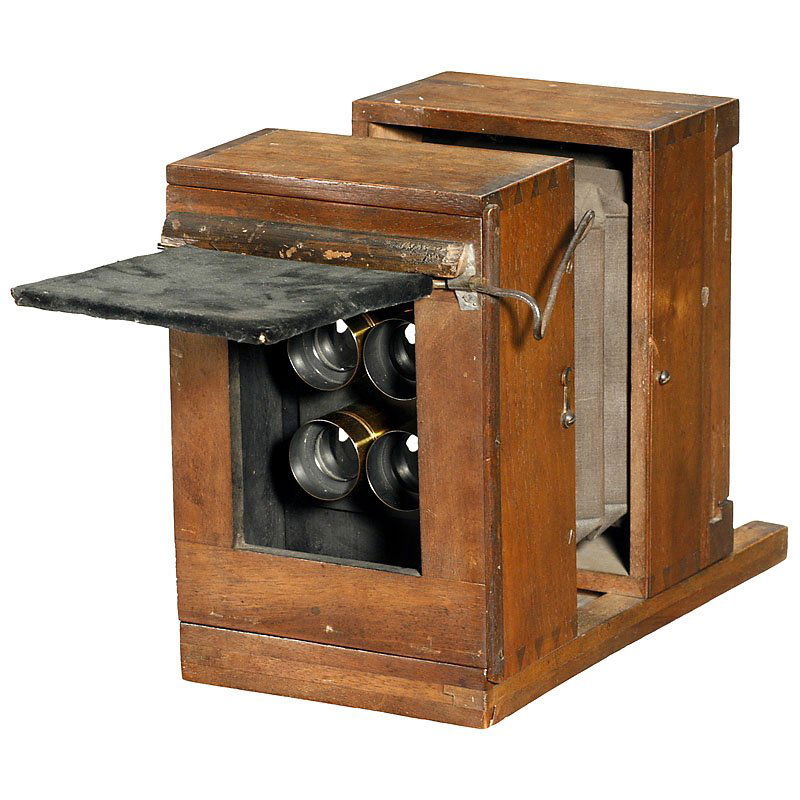 Multiple Camera, c. 1860: Multiple Camera, c. 1860 For 4 pictures on plate 9 x 12 cm (4 x 4 x 5 cm), presumably French, wet-plate collodion process, walnut body, brown/black bellows, 4 brass lenses (not changeable), focusing s