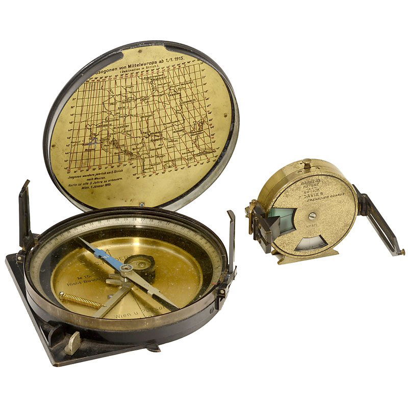 2 Military Sighting Compasses: 2 Military Sighting Compasses 1) Davis, London, c. 1900. Barker's patent, no. 521, brass, Ø 2 ¾ in., in leather pouch. – And: 2) Goerz, Wien, c. 1915, no. 171, Ø 5 ½ in., lid with middle Europe