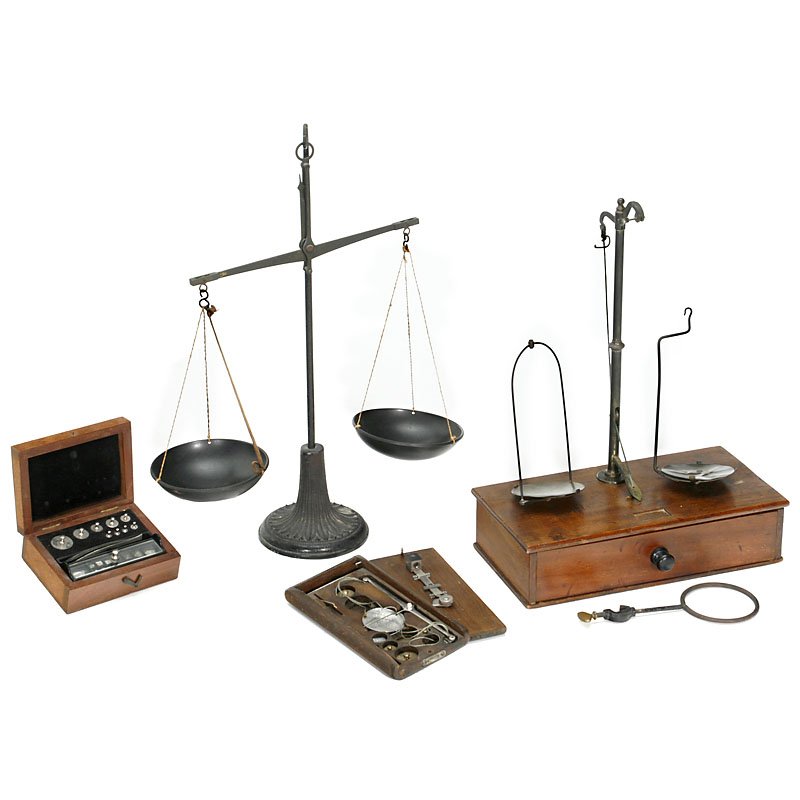 Small Collection of Scales and Weights, c. 1900: Small Collection of Scales and Weights, c. 1900 1) Pharmacy beam scale, cast iron with ebonite pans, height: 17 ¾ in. – 2) Gold or fine balance, with weights (not complete) in wooden case. – And