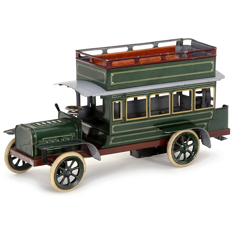 Bing Double-Decker Bus No. 14299/3, from 1910: Bing Double-Decker Bus No. 14299/3, from 1910 Bing Werke, Nuremberg; lithographed tin, clockwork, working, adjustable front wheels, brake, rubber tires, length 11 2/5 in. Doppeldecker-Bus "Bing" Nr. 1