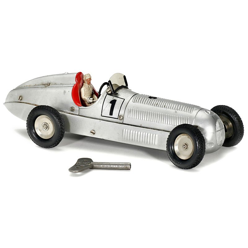 Märklin Racing Car No. 1, c. 1930: Märklin Racing Car No. 1, c. 1930 Construction kit car, clockwork, working, driver figure, original key, length 10 ½ in. Rennwagen "Märklin" Nr. 1, um 1930 Baukastenwagen, Blech, Federwerk, funktio