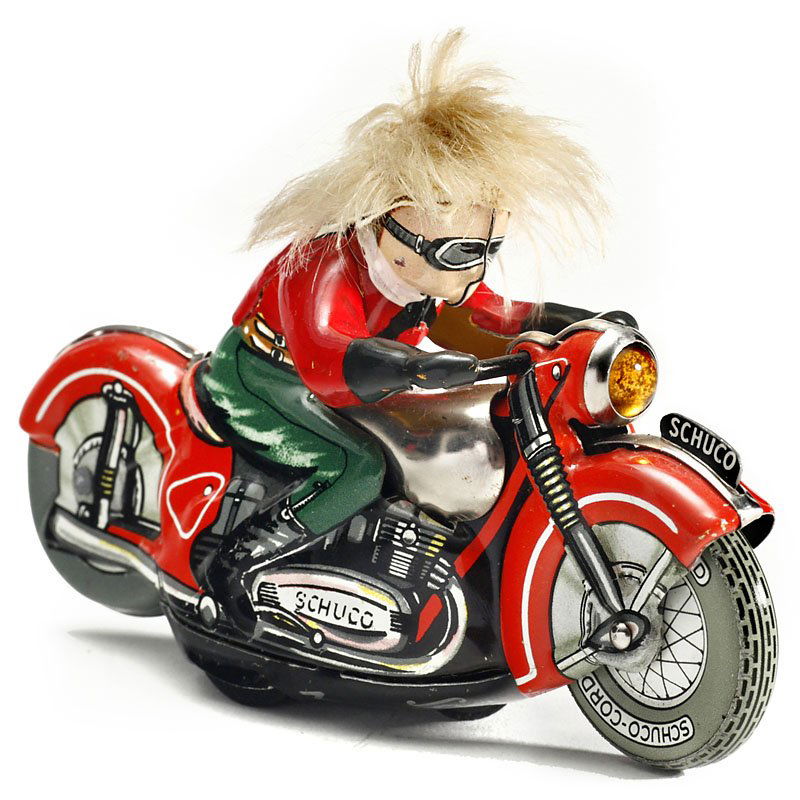 Schuco Mirakomot Motorcycle No. 1012, c. 1955: Schuco Mirakomot Motorcycle No. 1012, c. 1955 Made in Western Germany, lithographed tin, clockwork, working, length 5 1/10 in., very good condition. An unusual version with a different head. Mirakomot