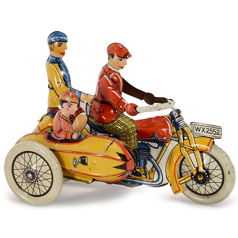 Gely Motorcycle with Sidecar, c. 1920: Gely Motorcycle with Sidecar, c. 1920 Georg Levy, Nuremberg. No. WX2552, lithographed tin, clockwork, working, length 6 1/10 in. Version with spoked-effect wheels. "Gely" Motorrad mit Beiwagen, um 192