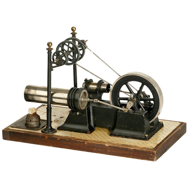 Carette Horizontal Hot-Air Motor No. 687/3, c. 1910: Carette Horizontal Hot-Air Motor No. 687/3, c. 1910 Air-cooled, working and displacing cylinders arranged side by side, wooden base with metal plate, without burner cover and chimney, size 15 x 7 4/5 