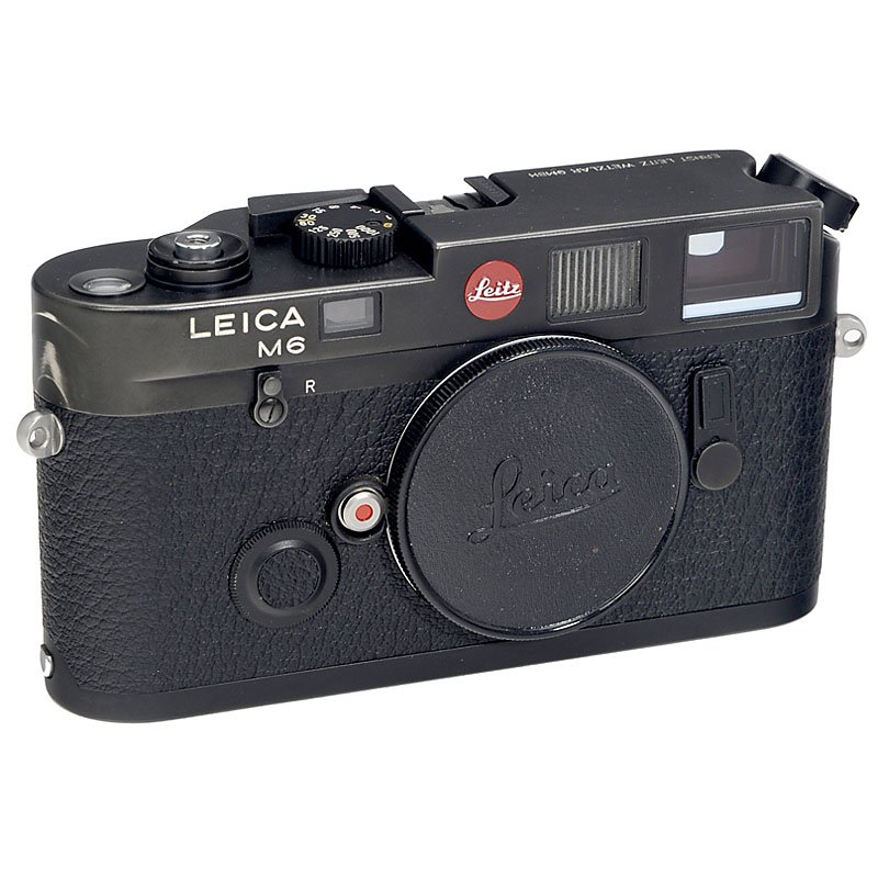 Leica M6 Body, 1985: Leica M6 Body, 1985 Leica, Solms. No. 1688811, black, with circular Leitz logo, "Ernst Leitz Wetzlar GmbH", engraving on top cover. Leica M6 Gehäuse, 1985 Leica, Solms. Nr. 1688811, schwarz, mit rund