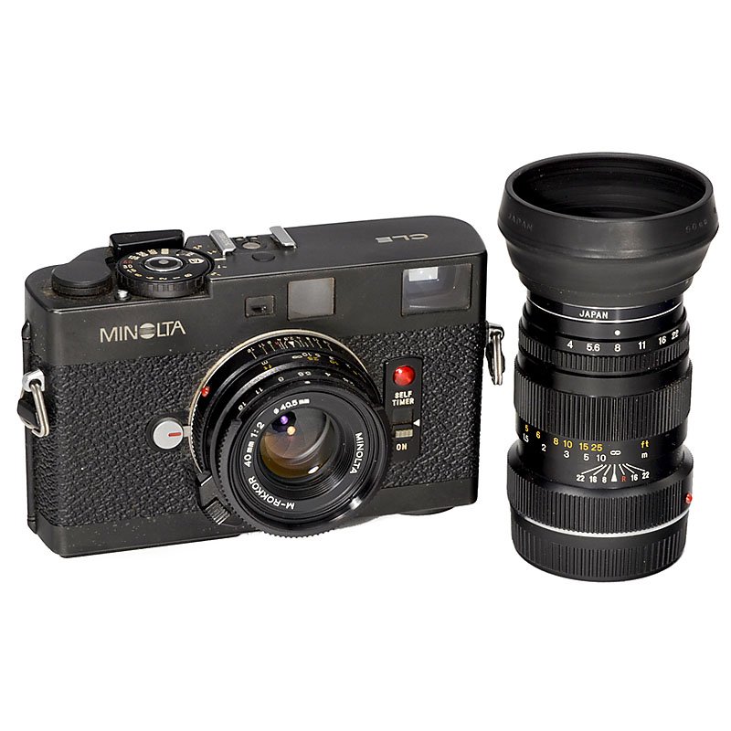 Minolta CLE with 2 Lenses: Minolta CLE with 2 Lenses Minolta, Japan. 1) Minolta CLE, 1981, no. 1005226, the advanced Leica CL with TTL-controlled focal plane shutter. With M-Rokkor 2/40 mm. (3/2-) – And: 2) M-Rokkor 4/90 mm, 