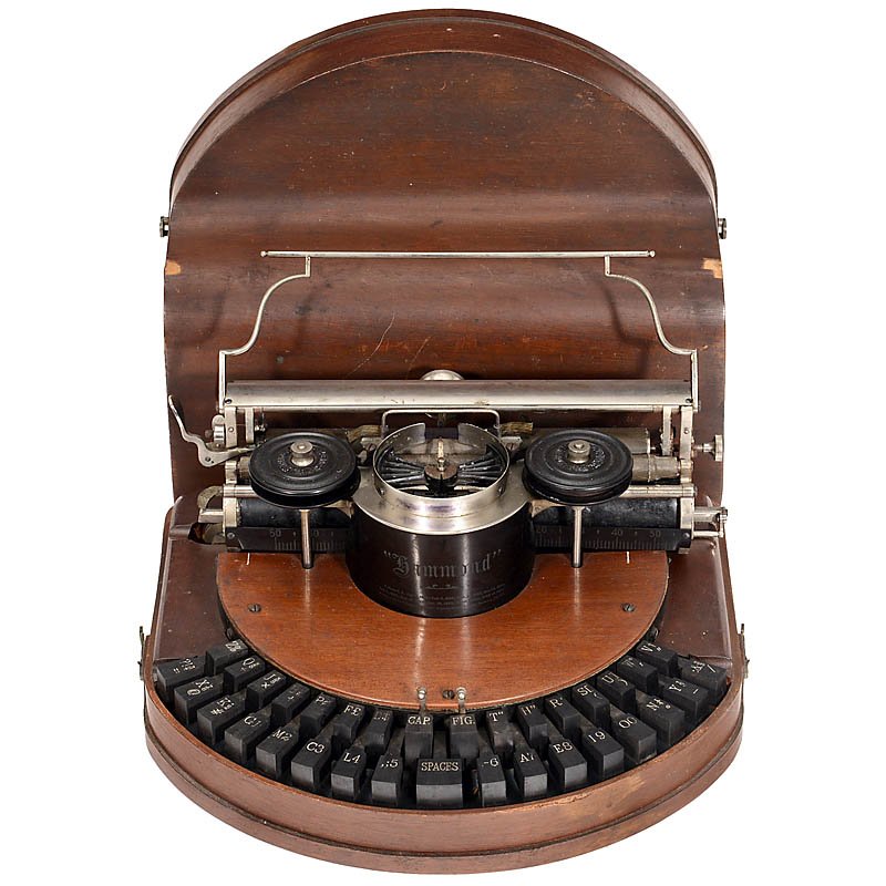 Hammond No. 1, 1880: Hammond No. 1, 1880 Early American typewriter with 2-row split "piano" keyboard and wooden cover! Serial no. 9313. – Literature: Martin, 1949, p. 79. – An important collector's item! Hammond No. 1