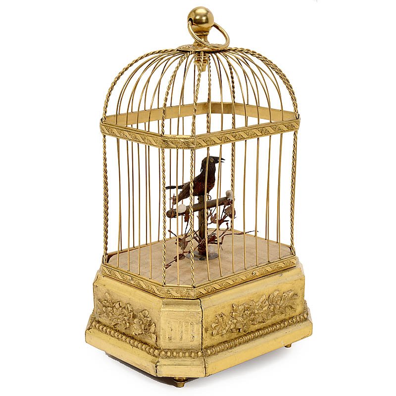 Automaton Singing Bird in Cage, c. 1930: Automaton Singing Bird in Cage, c. 1930 Manufacturer probably Bontems, gilt-brass cage on gilt wood base, going-barrel movement with bellows wound from the underside, bird on brass perch with cloth fl
