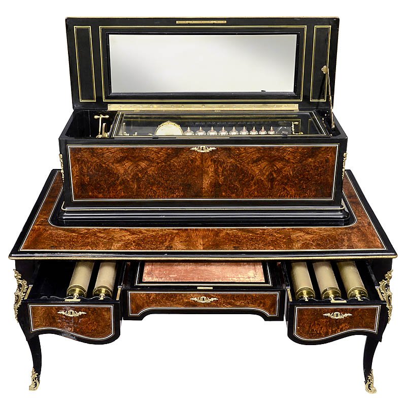 Exhibition-Standard Full Orchestral Musical Change able: Exhibition-Standard Full Orchestral Musical Change able Box on Escritoire, c. 1880 No. 5128, probably by Heller, with six twelve-air cylinders accompanied by 38-key organ, nine engine-turned graduated