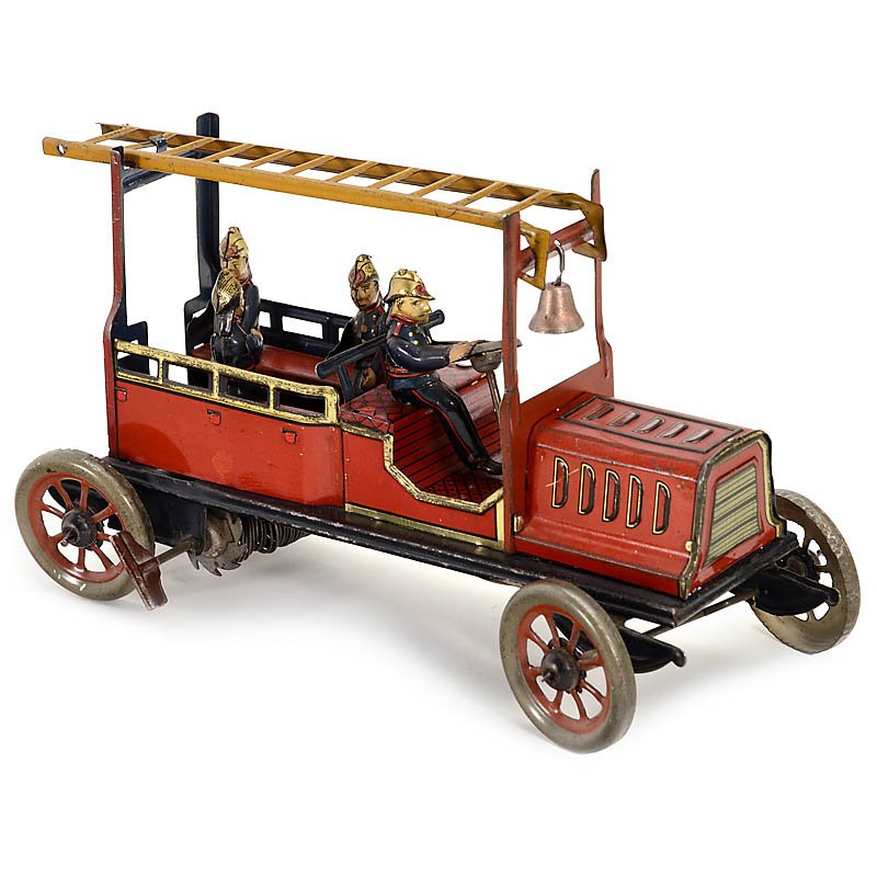 Fire Brigade Car by Hans Eberl, c. 1910: Fire Brigade Car by Hans Eberl, c. 1910 Crew wagon with ladder, lithographed tin, spiral spring drive, working, length 8 ¼ in., very rare. Feuerwehr "Hans Eberl", um 1910 Mannschaftswagen mit Leiter,
