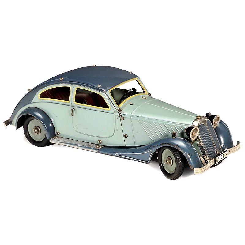 Märklin Tin-Kit-Car Mercedes Sedan, c. 1940: Märklin Tin-Kit-Car Mercedes Sedan, c. 1940 Streamlined car, hand-painted tin, clockwork (working), steerable front axle, leaf springs, electric headlights, opening driver's door (hinge repaired), le