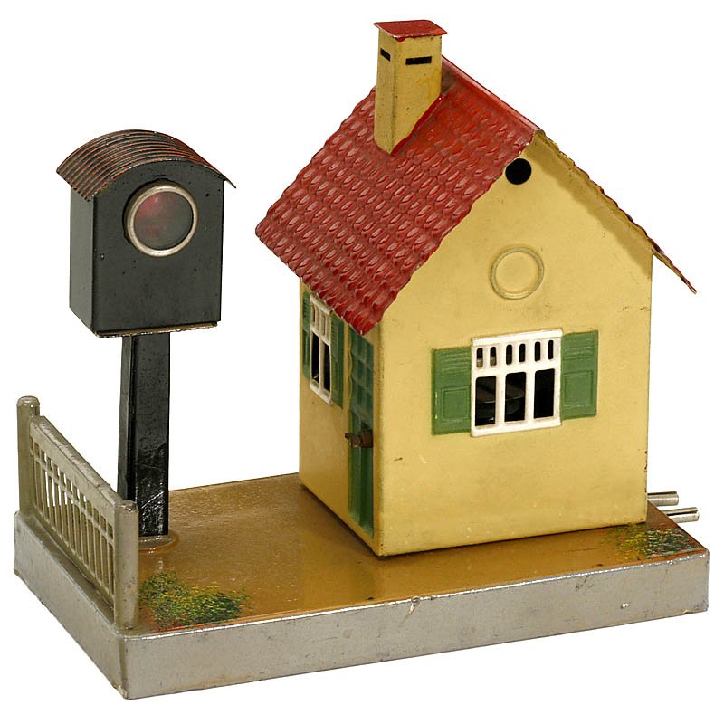 Märklin Crossing Keeper's Hut No. 13761, c. 1930: Märklin Crossing Keeper's Hut No. 13761, c. 1930 Hand-japanned tin, with light signal and buzzer, 5 ½ x 3 ½ x 5 in. Wärterhäuschen "Märklin" Nr. 13761, um 1930 Handlackiertes Blech, Lichtsignal