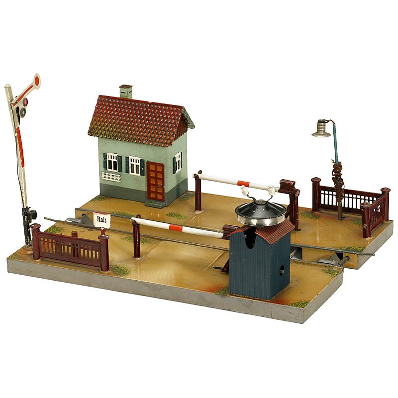 Märklin Level Crossing No. 2195, c. 1930: Märklin Level Crossing No. 2195, c. 1930 Hand-japanned tin, clockwork, suitable for gauge 0 and I, without tree and figures, 14 1/5 in. wide. Zweiseitige Bahnschranke "Märklin" Nr. 2195, um 1930 Han