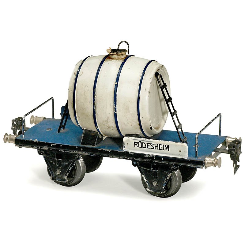 Märklin Wine Waggon No. 1976, Gauge I, c. 1930: Märklin Wine Waggon No. 1976, Gauge I, c. 1930 Model "Rüdesheim", hand-painted tin in original finish, length 7 ¾ in. Weinwagen "Rüdesheim" "Märklin" Nr. 1976 Spur I, um 1930 Handlackiertes Blech