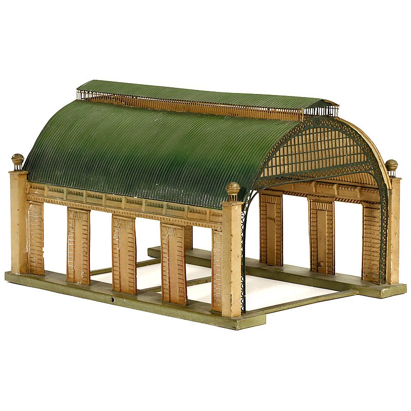 Märklin Covered Junction Station No. 2078/1, Gauge I,: Märklin Covered Junction Station No. 2078/1, Gauge I, c. 1935 Suitable for 2 tracks, painted tin (original finish), facade with transparent windows, one column without crown, size 22 ½ x 16 x 13 in.