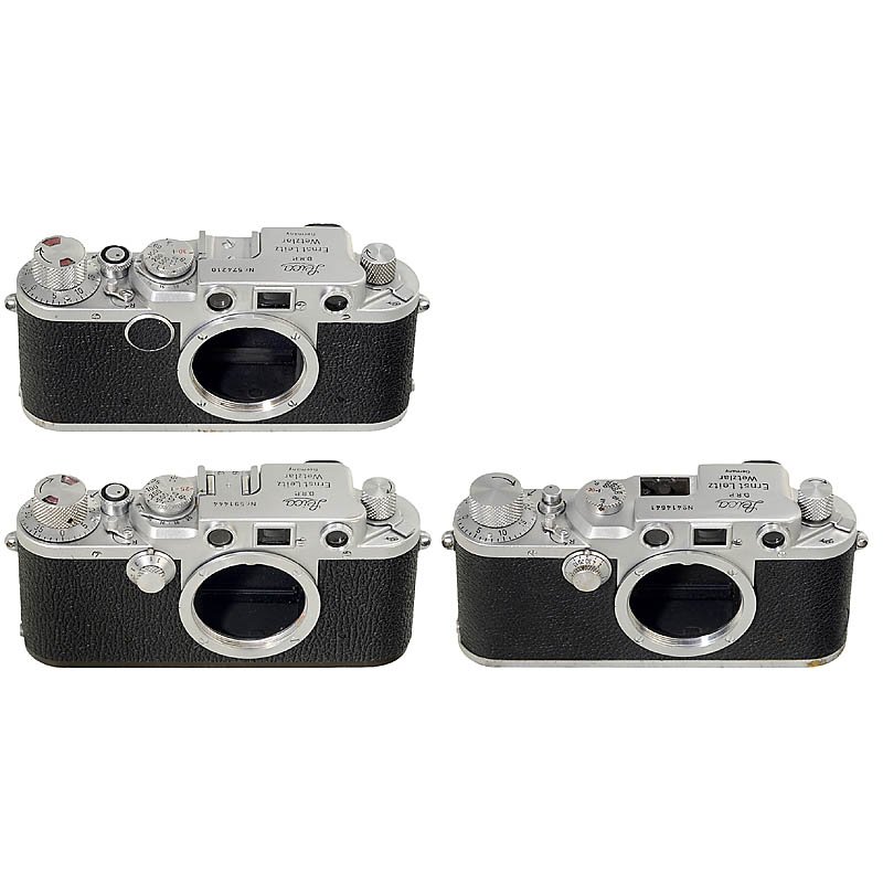 3 Post-War Leica Bodies: 3 Post-War Leica Bodies Leitz, Wetzlar. 1) Leica IIIc, no. 414641, 1946, accessory shoe missing. (4/3-) – 2) Leica IIf, no. 574210, 1952, black dial, speed sequence 30/40/60. (3+/3+) – And: 3) Lei