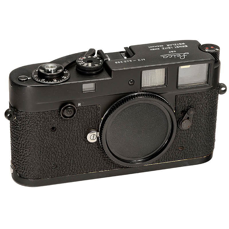 Leica M2, Black Repainted, 1958: Leica M2, Black Repainted, 1958 Leitz, Wetzlar. No. M2-942396, no self-timer, still with rewind button. Shutter working, focusing needs adjustment, baseplate locking missing. Black refurbished, not or