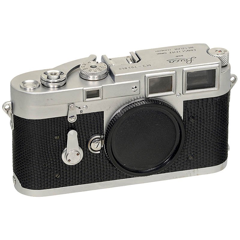 Leica M3 (Snake Skin), 1954: Leica M3 (Snake Skin), 1954 Leitz, Wetzlar. No. M3-703850, double-stroke advance, without field frame selector, beveled cut lens, lock release button. Rangefinder needs adjustment. Beautified with bla