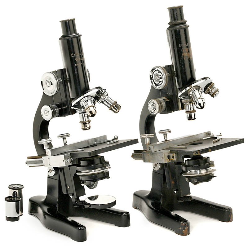 2 Leitz Microscopes, c. 1938: 2 Leitz Microscopes, c. 1938 Ernst Leitz, Wetzlar, serial nos. 318047 and 346469, both with double-mirror, condenser, XY mover, triple-nosepiece, coarse and fine adjustment, height 12 ¾ in., with acc