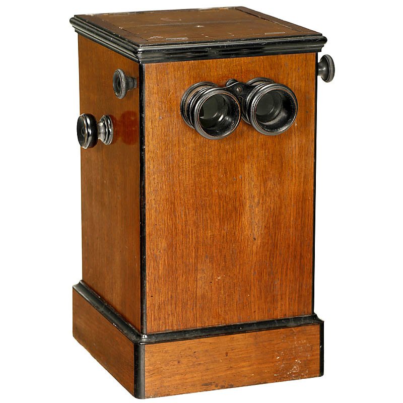 Table Stereoscope. c. 1880: Table Stereoscope. c. 1880 Probably "Unis France", for 50 stereo cards or slides 9 x 18 cm, focusable wooden oculars, chain-operated mechanism, walnut case, height 17 1/3 in., with approx. 50 photos. 