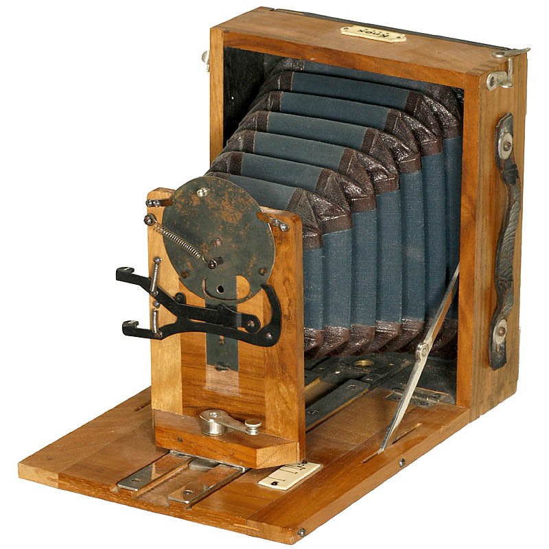 Knox by Wünsche, c. 1906: Knox by Wünsche, c. 1906 Emil Wünsche, Reick b/Dresden. Polished-wood folding-bed camera for plates 9 x 12 cm, green bellows with black corners, rotary shutter, focusing screen back. Knox von Wünsc