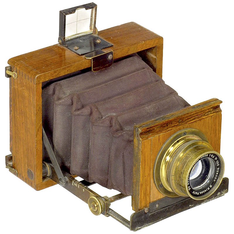 Tropical Camera with Planar 100 mm: Tropical Camera with Planar 100 mm Probably French, 6,5 x 9 cm. Brass E. Krauss, Paris Planar-Zeiss 4,5/100 lens, no. 98688, brown leather bellows. Newton viewfinder. Rack-and-pinion movement. Ground