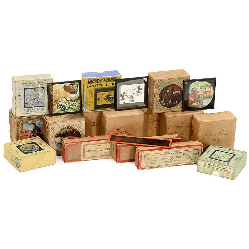 Group of Magic Lantern Slides: Group of Magic Lantern Slides 11 boxes of 3 ¼ in. slides, including fairy-tales in English, Italian, 3 sets of "Uncle Tom" (Amsterdam) and Ensign "Mickey Mouse in the Gorilla Mystery" (film lifting).