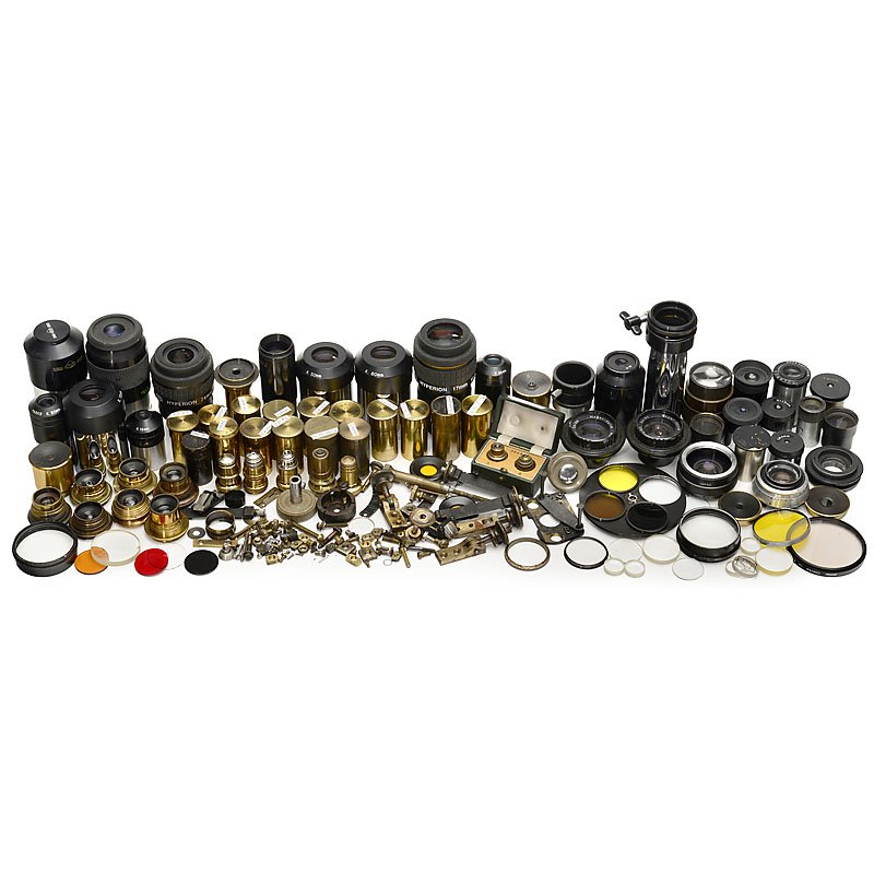 Collection of Microscope and Telescope Parts: Collection of Microscope and Telescope Parts For 19th century and later instruments. 16 cased brass objectives, 2 early objectives in fishskin-covered case, further objective lenses, oculars, tubes, c
