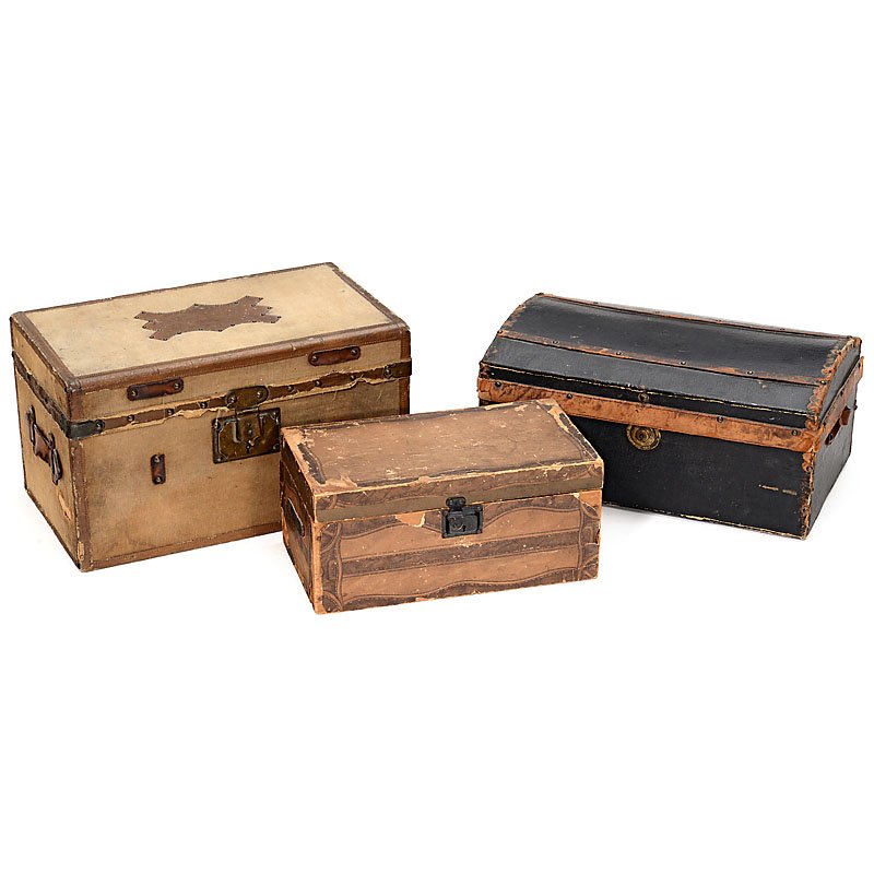 Three Doll's Trunks, Late 19th Century: Three Doll's Trunks, Late 19th Century 1) Domed-top painted imitation leather trunk with brown leather trim and handles, width 13 ¾ in. (35 cm). – 2) Leather-bound canvas-covered trunk, stamped "L.