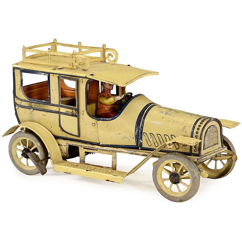 Large Limousine by Hans Eberl, Germany, c. 1920: Large Limousine by Hans Eberl, Germany, c. 1920 Marked: "Ebo Motor", lithographed tin, clockwork (working), 2 opening doors, driver figure, length 11 in. Große Limousine von Hans Eberl, um 1920 Bezei