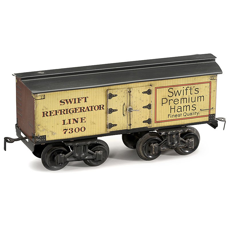 Bing Gauge I American Refrigerator Truck, c. 1915: Bing Gauge I American Refrigerator Truck, c. 1915 "Bing Miniature Railway System", with lettering "Swift's Premium Hams", lithographed tin, 2 bogies, 2 opening double-doors, length 9 in. Amerikanische