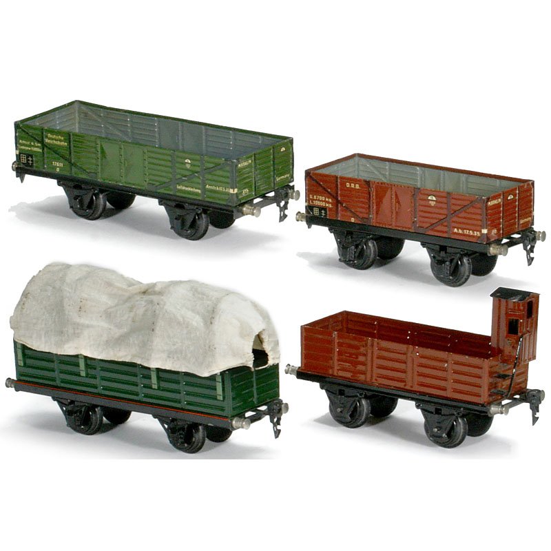 4 Gauge I Freight Wagons by Märklin, c. 1930: 4 Gauge I Freight Wagons by Märklin, c. 1930 1) Covered goods truck no. 19391. – 2) High-sided truck no. 19171. – 3) High-sided truck no. 17611. – And: 4) Open goods truck no. 16621. 4 Güterwa