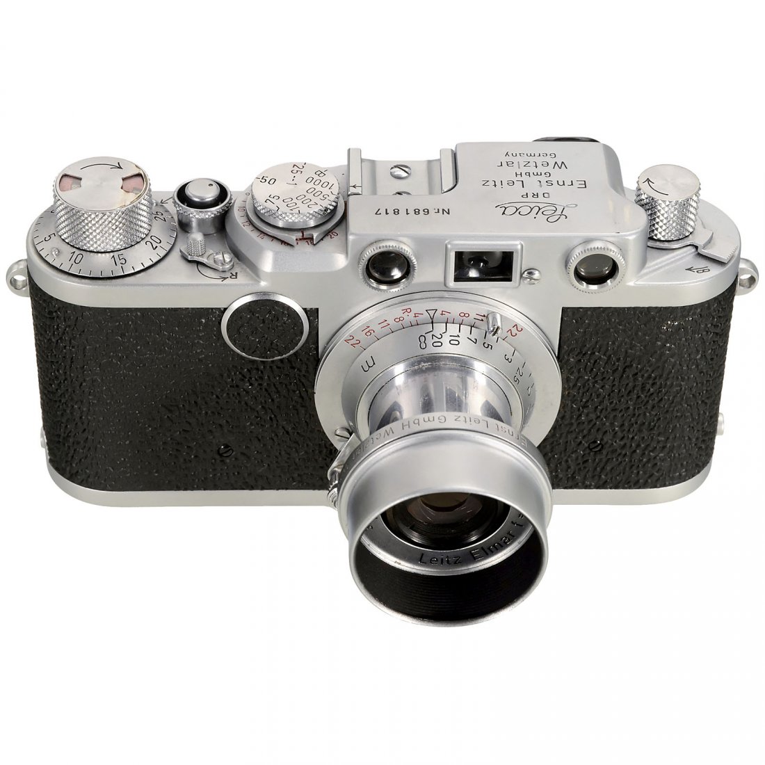 Leica IIf with Elmar, 1954: Leica IIf with Elmar, 1954 Leitz, Wetzlar. No. 681817, red-dial synchronization, 1/1.000 sec. With Elmar 3,5/5 cm, no. 1049720, with lens hood and lens cap. – Excellent condition. Leica IIf mit Elma