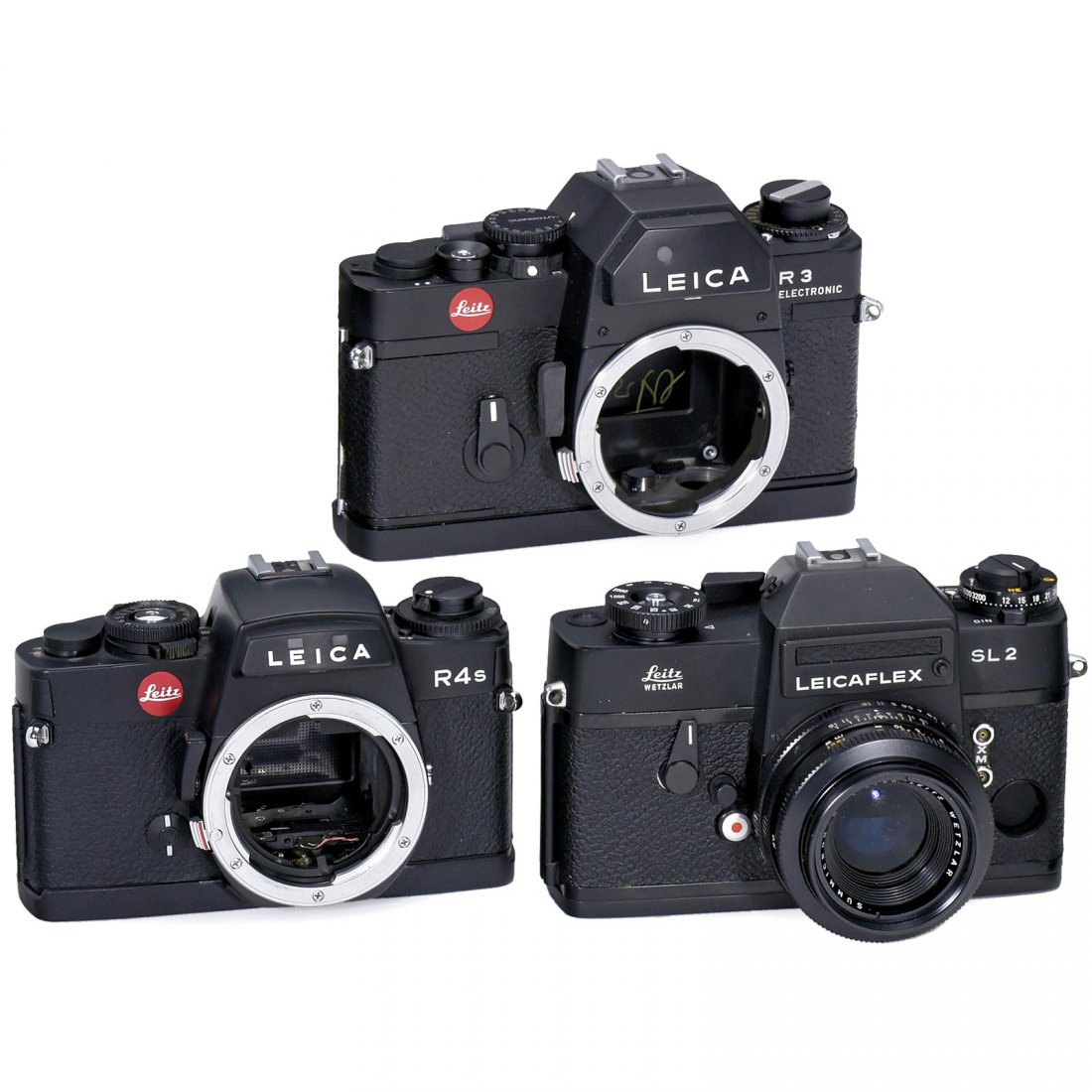 3 Leica Dummys: 3 Leica Dummys Leitz. 1) Leicaflex SL2, black., with Summicron 2/50 mm. – 2) Leica R3 Electronic. – And: 3) Leica R4s. 3 Leica Dummys Leitz. 1) Leicaflex SL2, schwarz, mit Summicron 2/50 mm. – 2