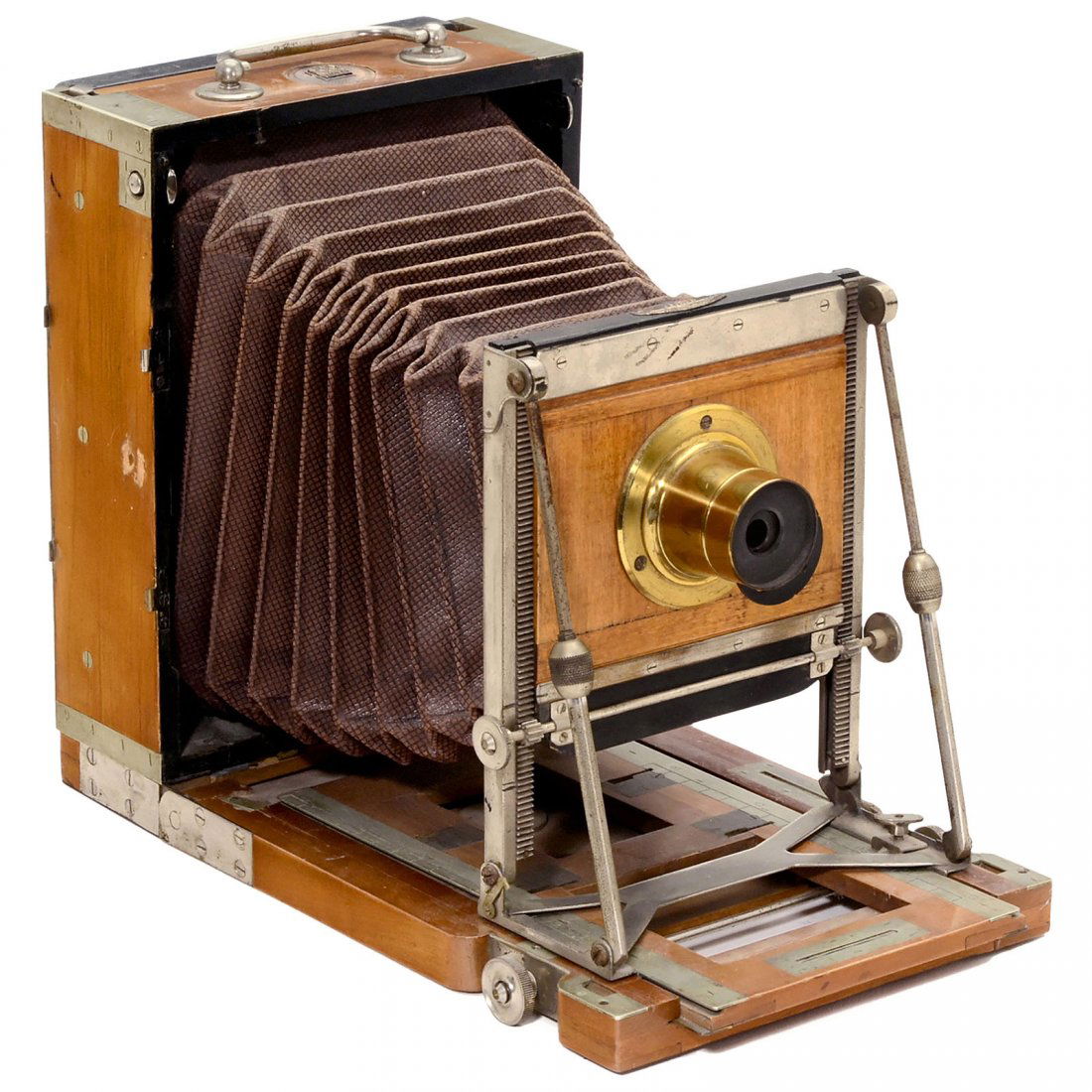 Tourist Camera by Mackenstein, c. 1895: Tourist Camera by Mackenstein, c. 1895 H. Mackenstein, Paris. Professional field camera, plate size 13 x 18 cm, body no. 845, tropical wood with nickel fittings, light-brown bellows, solid constructio