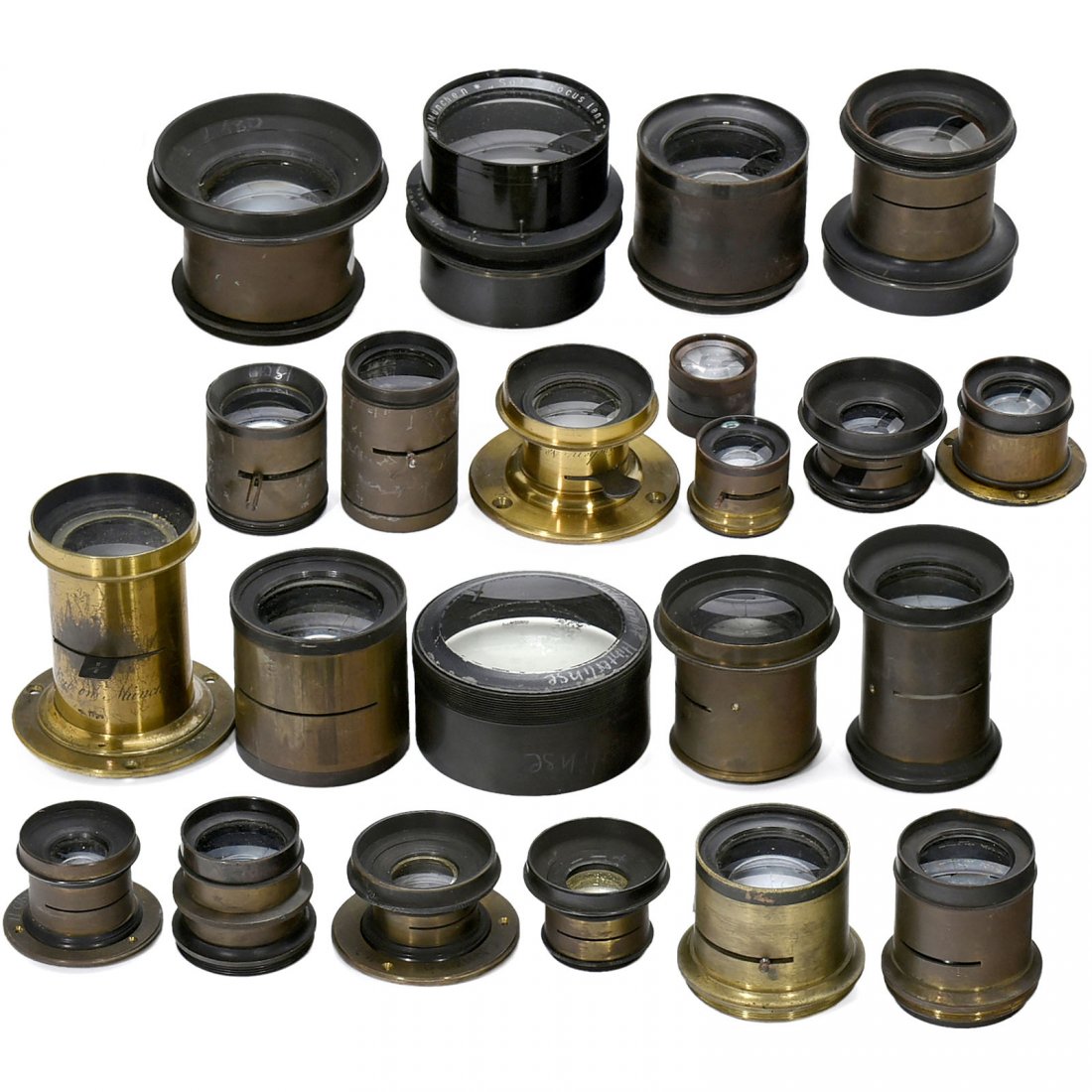 22 Brass Lenses, c. 1880–1900: 22 Brass Lenses, c. 1880–1900 Predominantly by Steinheil, partly without name of the items (preproduction models), height of the lenses between 25 mm and 80 mm, some lenses with cementation problems
