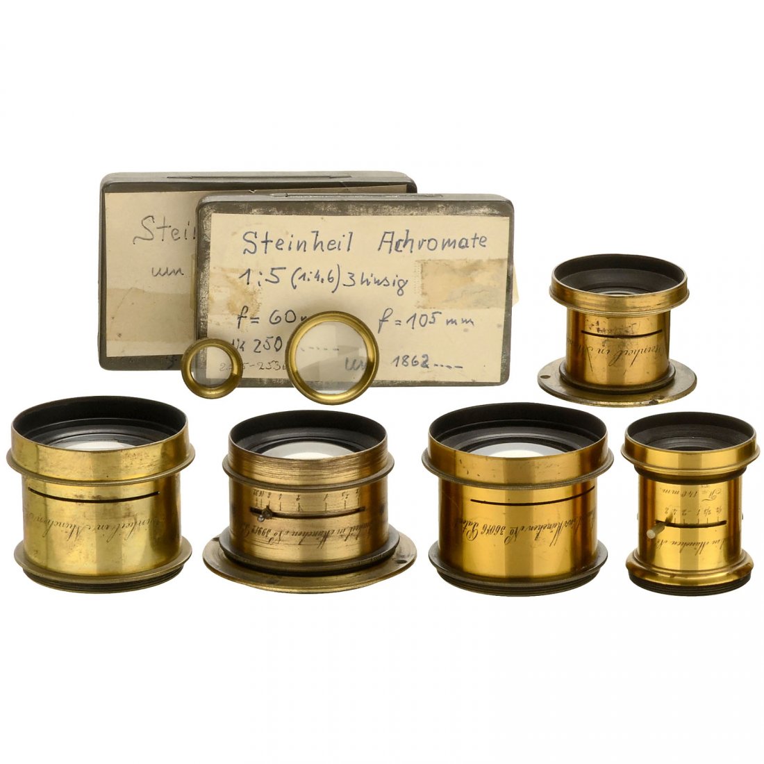 5 Steinheil Lenses: 5 Steinheil Lenses Steinheil, Munich. 5 mixed lenses for waterhouse and iris stops. Serial numbers: no. 11119, no. 19542, no. 36016, no. 38350 and no. 39912. Height of the lenses: 2 in. and 2 1/3 in. 