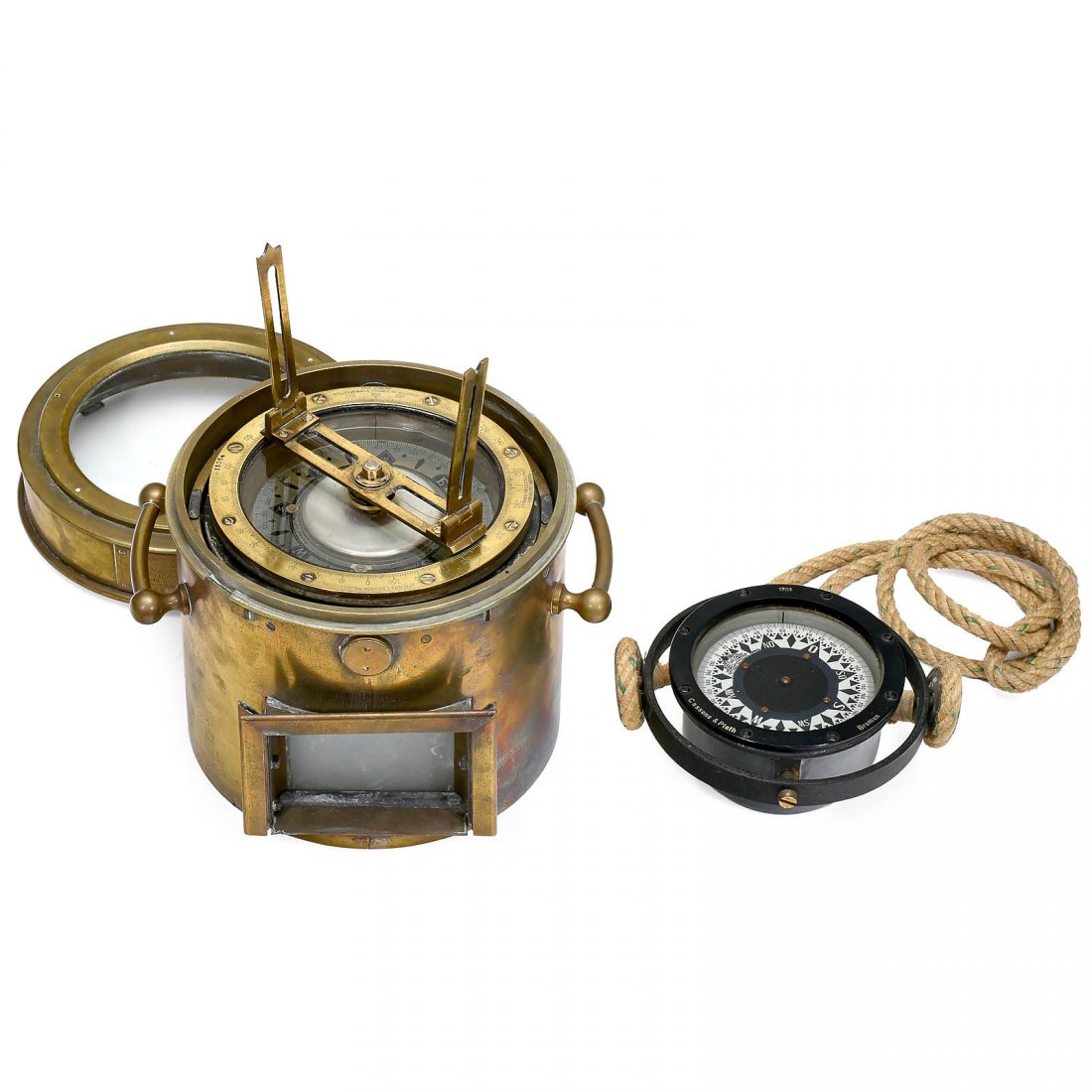 2 Marine Compasses, c. 1930: 2 Marine Compasses, c. 1930 Gimbal-mounted. 1) "Habitable Modèle 1932", by Ateliers L. Doignon, Seine. All brass, Ø 9 in. – And: 2) Cassens & Plath, Bremen, blackened brass, Ø 5 in. 2 Marinekompa