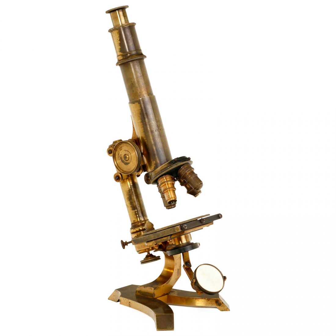 Rare Berlin Compound Microscope by Gundlach, c. 1870: Rare Berlin Compound Microscope by Gundlach, c. 1870 Signed on the tube: "E. Gundlach", original lacquered brass, double-mirror, iris diaphragm and condenser lens, rotating stage, delineated with mill