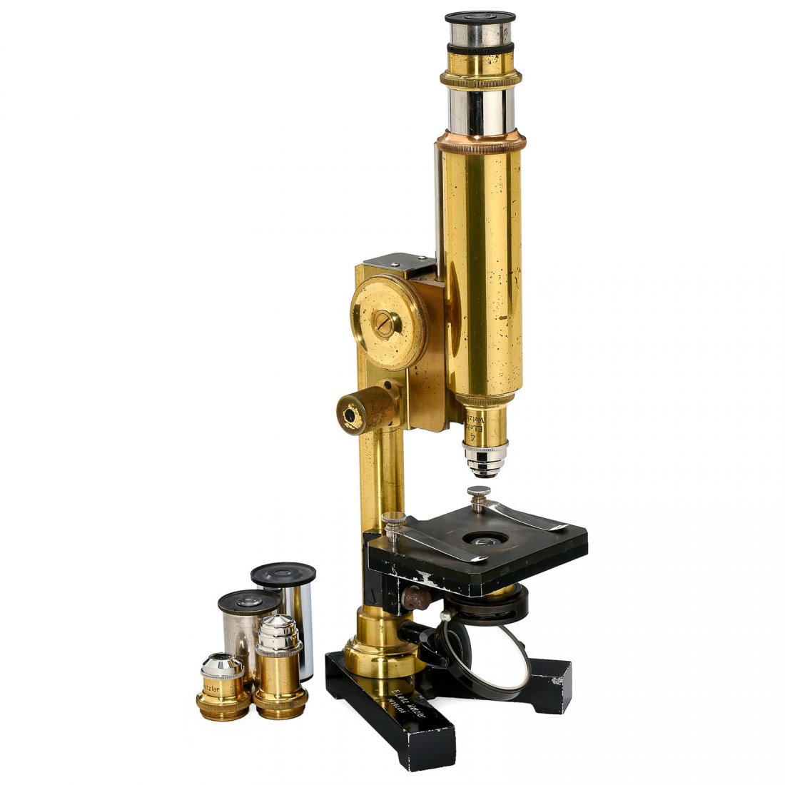Leitz Portable Compound Microscope, 1912: Leitz Portable Compound Microscope, 1912 Signed on the foot: "E. Leitz, Wetzlar", no. 161118, lacquered brass, blackened aluminum foot and stage, coarse and fine adjustment, 3 oculars, 3 objectives (n