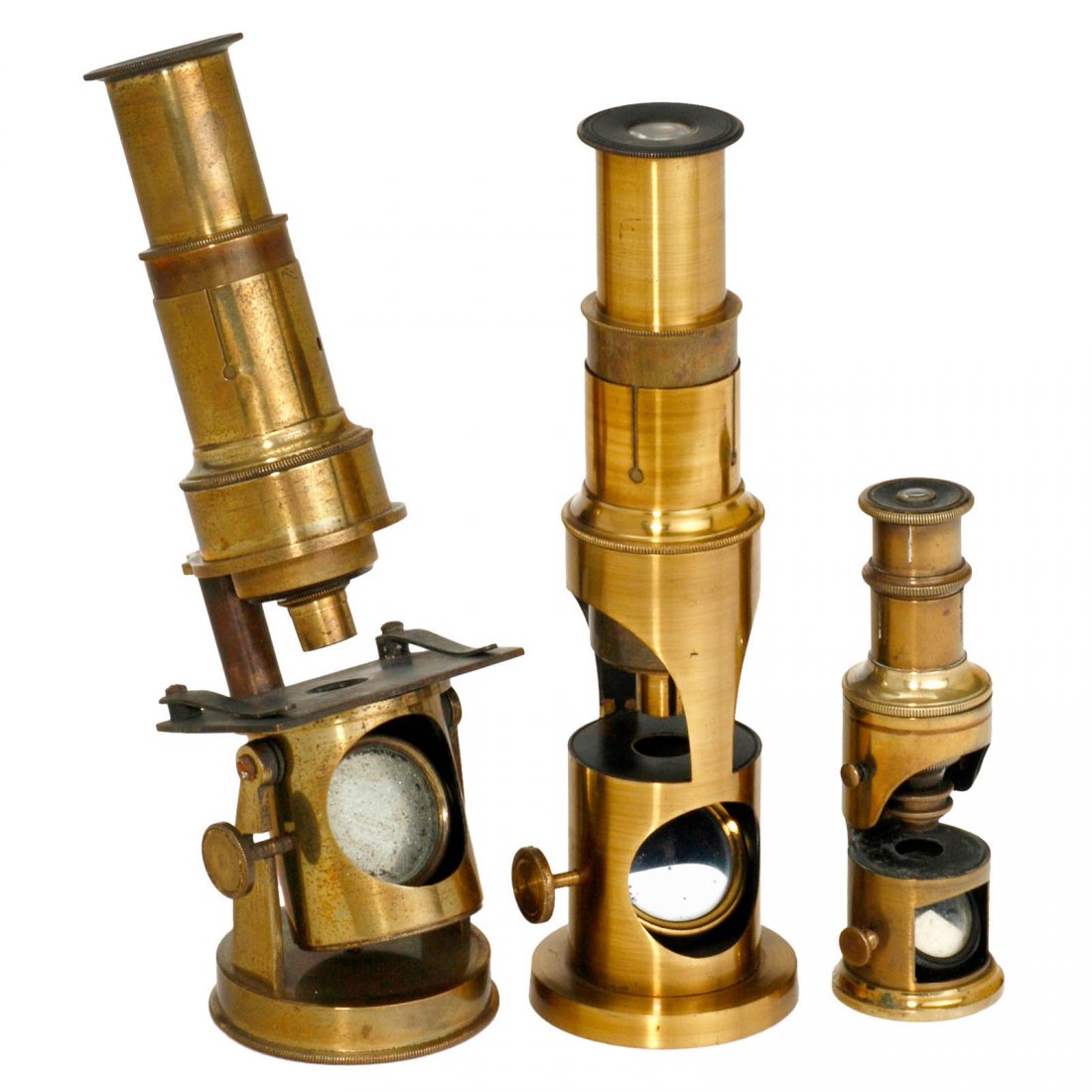 3 Small Drum-Type Microscopes, c. 1880: 3 Small Drum-Type Microscopes, c. 1880 With original lacquered brass. 1) England, height 6 ¼ in., attractive case with retailer's label "C.R. Brinkwater". – 2) Probably French, circular leaded bas