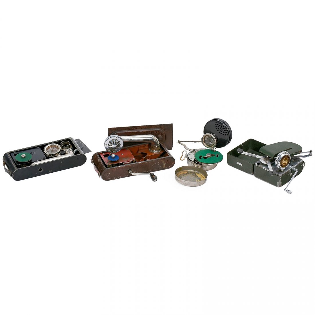 4 Miniature Gramophones, c. 1935: 4 Miniature Gramophones, c. 1935 1) Mikiphone pocket phonograph, Vadász pattern, Switzerland. – 2) Mikky Phone picnic gramophone, Japan. – 3) Swiss Thorens Excelda cameraphone. – And: 4) Russia